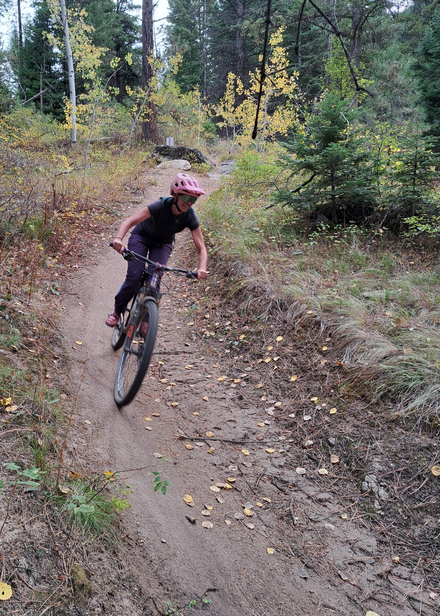 kristen mountain biking with the sun dog pants